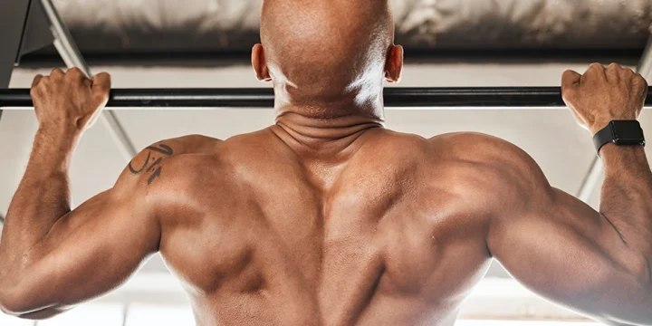 A man doing pull ups at home